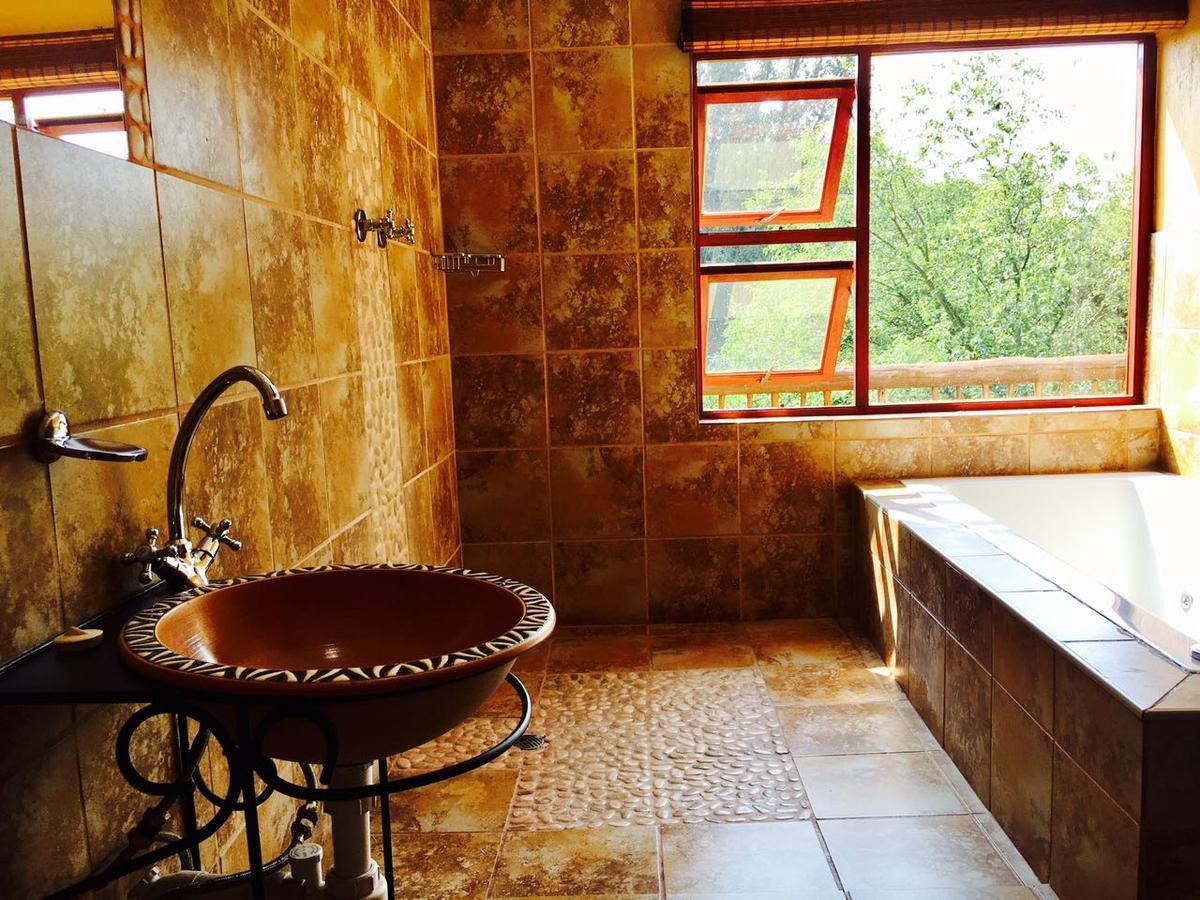 The Rivonia River Lodge ヨハネスブルグ エクステリア 写真